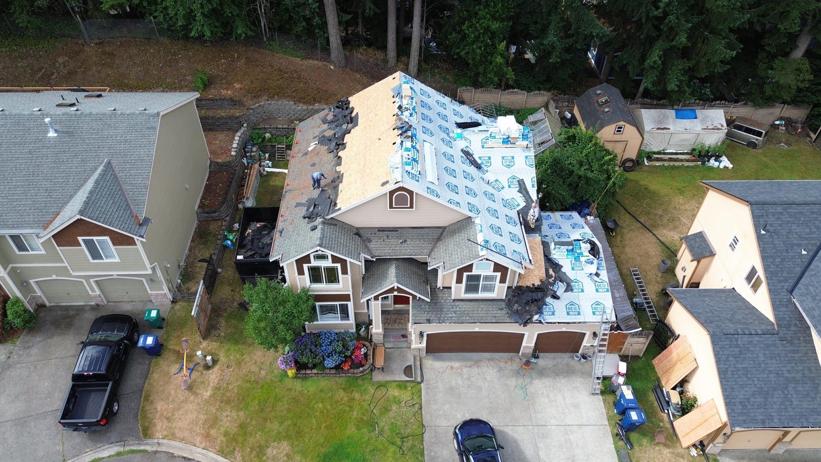 Aerial view of roof replacement in progress